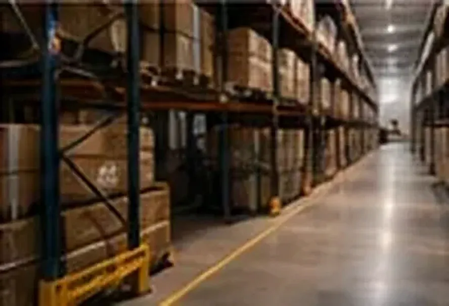 Warehouse aisle with pallet racking (illustrative image)